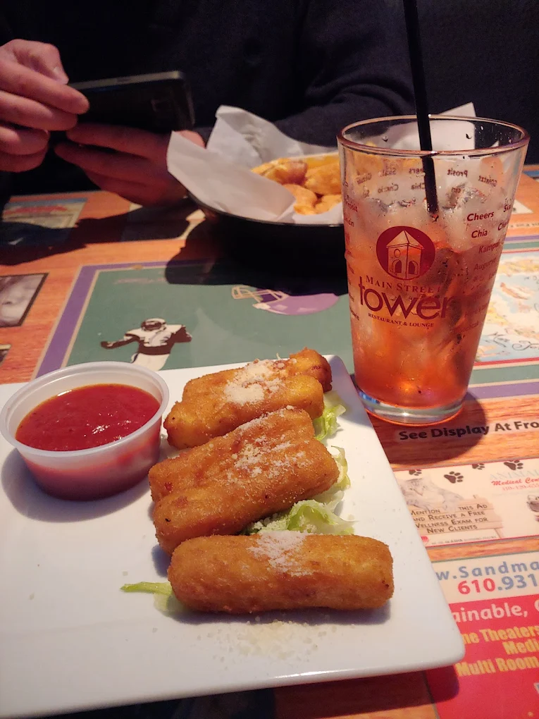 Mozzarella Sticks - Homemade fried mozzarella served with marinara.